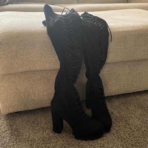 Black thigh high boots